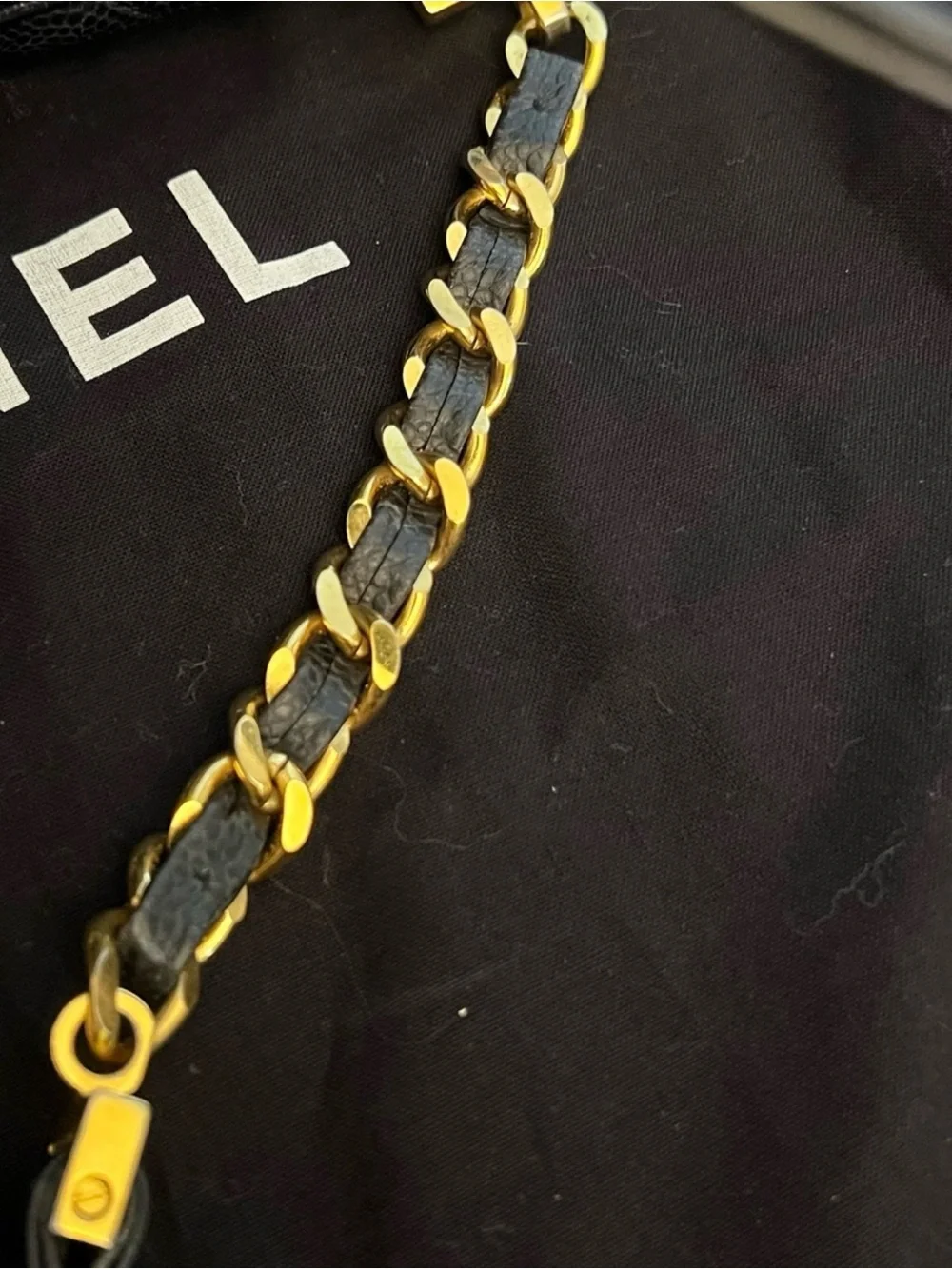 CHANEL Black Quilted Leather Backpack with Gold CC Accent